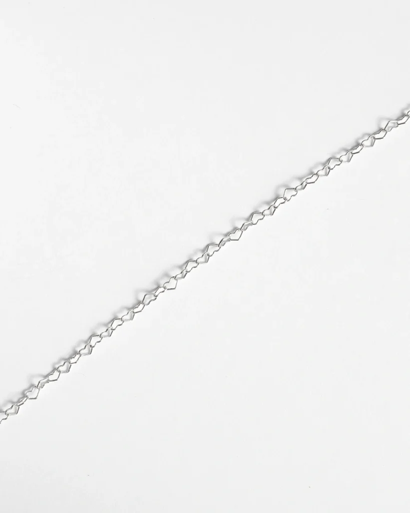 Silver chain bracelet on white background