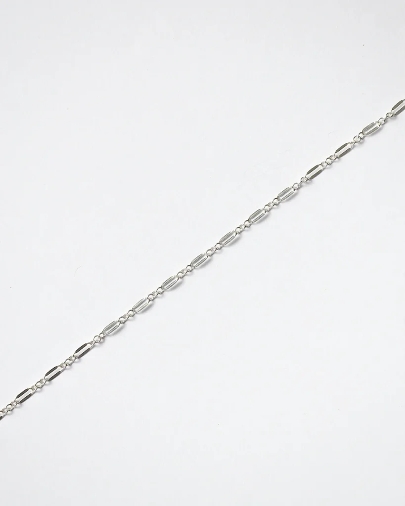Silver chain bracelet on white background